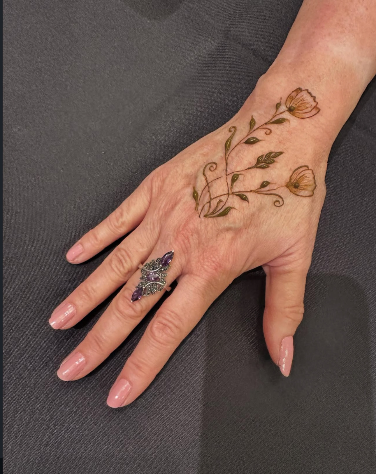 Floral henna hand design Edmonton